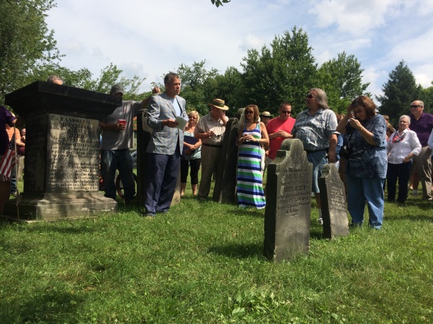 Steward of the Randolph Mitchell House and its legacy, Mr. Douglas Preisse delivers remarks at the Colonel’s grave in New Reading Cemetery. 